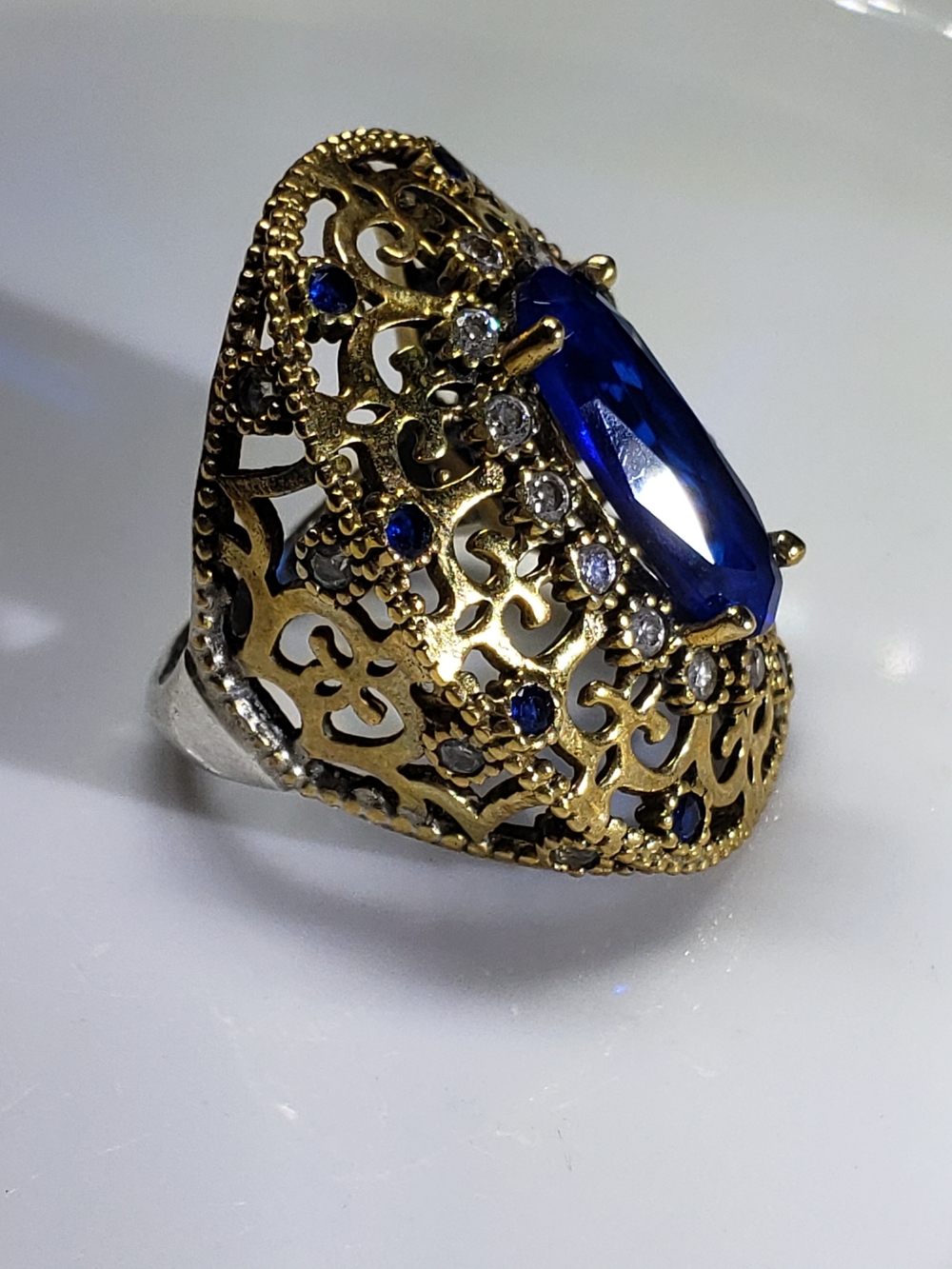 Gold Filigree Ring with Blue Crystal Center